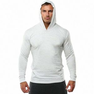 Marca Abbigliamento da palestra Tinta unita Lg Manica con cappuccio Slim Fit T Shirt Uomo Cott Tee Shirt Bodybuilding Fitn Sportwear Tshirt M33i #