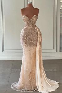Underbara champa sjöjungfru klänningar med avtagbar kjol sexig älskling rygglösa pärlor rufsar långa aftonklänningar bc15353