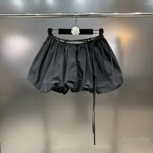 Kjolar knopp kort kjol för kvinnor fast färg all-matchande elastisk midja dragskon tredimensionell bubbla pantskirt 2024
