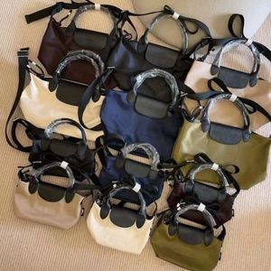 Shop Crossbody Bag billig exportieren hochwertige Energieumweltschutz Seri recycelte Nylonknödelband Schulter Handheld Single