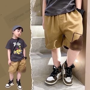 Fashion boys cartoon letter printed shorts kids stereo pocket half shorts 2024 summer children loose casual short pants Z7361