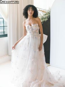 Abiti da sposa floreali Stampa abiti da sposa con innamorato floreale Una linea con fiocco Graziosi abiti da noiva