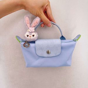 Shop Crossbody Bag billige Export Frauen 2024 Neue modische Frühlings-/Sommer -Mini -Hand kleine und beliebte Knödel Telefon Zero Wallet