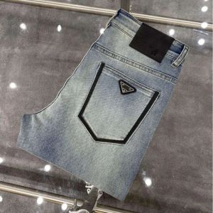 Högkvalitativa män jeans designer byxor män smal liten rak bomull casual denim byxor modea triangel logotyp brev grafiska denims byxor