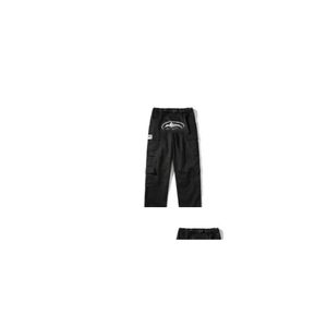 Mens Pants Amerikan Retro Retro High Street Moda Markası Hip-Hop Baskılı Sıradan MTI-Pocket Yan Toka ve Kadınlar Aynı Çöplükler Ins Drop de Otzyx