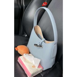 Factory Source High Quality Handbags Is Unique Bamboo Button Bag 2024 New Advanced Litchi Pattern Underarm for Leisure and Commuter