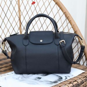 Factory Source High Quality Handbags Is New Top Layer Cowhide Leather Bag with Large Capacity and Texture Portable Simple Boston