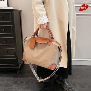 Factory Source High Quality Handbags Is 2024 New Nylon Fabric Lightweight Handheld Dumpling Bag Trendy and High End Contrast Color Single Shoulder Crossbody