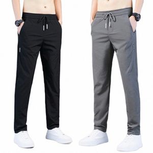 2022 Męskie spodnie wiosną lato Nowy cienki zielony solidny kolor Fi Kieszonkowy aplikacja Pełna długość Casual Work Pants Pantal L0WZ#