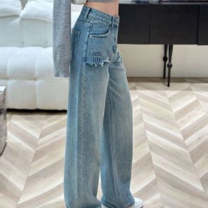 Pantaloni firmati jeans strappati pantaloni in denim con grafica con lettera di giunzione alla moda da donna pantaloni casual in denim dritto allentato