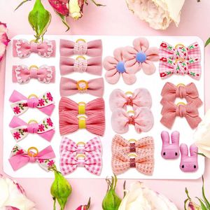 Odzież dla psów 10pcs różowy styl bownot małe kokardki do włosów z gumowymi opaskami dekorat akcesoriów pielęgnacji zwierząt domowych