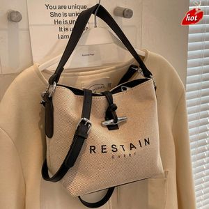 Factory Source High Quality Handbags Is High Bag 2024 Spring New Fashionable Canvas Crossbody Niche Design Portable Tote
