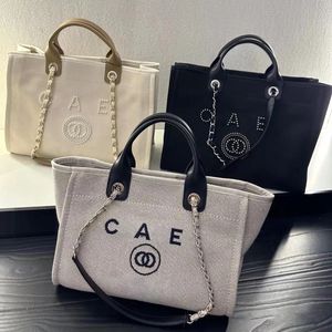 Tote çanta yaz sıcak sahil çanta tasarımcı çanta kadınlar alışveriş çantaları çanta yüksek kapasiteli bez çanta cüzdan klasik siyah crossbody oldukça çok işlevli turizm boş zaman