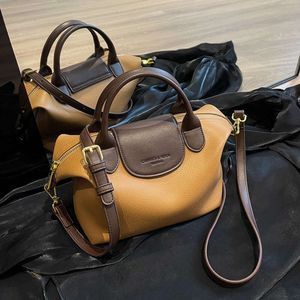 Mağaza Crossbody Bag Ucuz İhracat Kadınları 2024 Yeni Modaya ve Şık Yüksek Duygusal Çöp Straddle Küçük Kalabalık Çanta Tek Omuz Demetleme Çörek