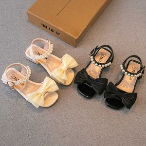 Sandaler Nya prinsesskor Barnens lilla sommarlala flicka Bow Beach Shoes Fashion Sandal klackar Sandaler Barnskor 240327