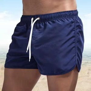 Men's Swimwear New Men Gym Fitness shorts soltos cor de fisiculturismo do verão Summer seco rápido calça curta de masculino marca de praia casual calça de moletom 24327