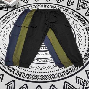 Designer 8131#Stone Stone Compass Cross Cuff Label Casual Pants for Men and Women's Sports Lose Solid Color Simple Workwear och Badrumbyxor WDF8