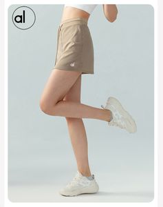 LA Mesmo estilo feminino esportivo curto saia plissada tênis saia anti-exposição yoga culottes Yoga Outfits Butt Workout Biker Shorts Cintura Alta Mulheres Sem Costura Curto NOVO