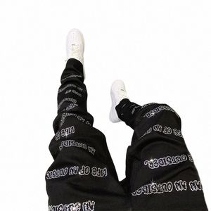 Nowy mężczyzna Elastyczne dżinsy Czarne chude gorące wiertło punkowe motocykl streetwearne spodnie Męskie środki Slim Fit Fi Designer Pencil Pants U5qa#