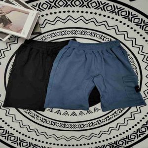 Designer 602 # Stone Stone Compass Mangas Cruzadas Shorts Casuais para Homens e Mulheres Versáteis Soltos Esportes Calças de Praia Reta 1U5C