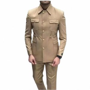 Męskie płaszcze okłady homme złotą tyłek safari ludzie garnitury 2 sztuki przyjęcie weselne pana młodzieńczy zamykający kołnierz Slim Fit Busin Wedding Blazers R6ro# Z240606