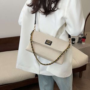 Geschäfte Export -Designer -Umhängetaschen große Kapazitätskettenhandtasche für Frauen in 2024 Neue modische Leinwand falten Ohrbeutel Trendy und einfaches Crossbody