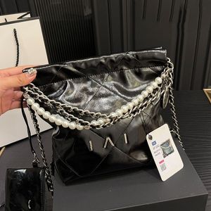 Ladies Designer Mini Garbage Bag Glossy Oil Wax Leather Gold/Silver Coins Charm Pearl Chain Carved Letters Hardware Outdoor Luxury Shoulder Cross Handbag 24x21cm