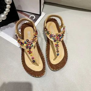 Sandálias Retro Boêmio Frisado Flores Flat Heeled Mulheres Verão Open Toe Mulher Elastic Strap Roma Sapatos Sandalias Jer H240328GRWF