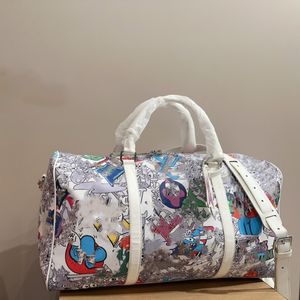 24SS Erkek ve Kadın Lüks Tasarımcısı Graffiti Seyahat Çantası Kadın Çanta Omuz Çantası Crossbody Çantası Seyahat Çantası Duffel Bag Havaalanı Çantası 50cm