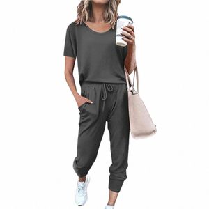 Kobiety Summer Casual Tracksuits 2024 Solidny kolor luźne pullover dwuczęściowy zestaw samica lg rękawów