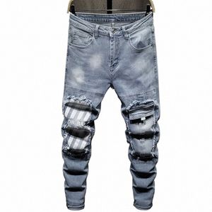 2024 Spring och Autumn New Fi Trend Elastic Ripped Jeans Men's Casual Slim bekväm högkvalitativ liten fotbyxor 28-36 6998#