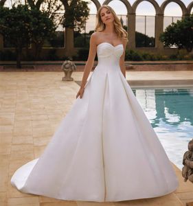 Elegant Long Sweetheart Satin Wedding Dresses With Pockets/Removable Sleeves A-Line Ivory Sweep Train Zipper Back Bridal Gowns for Women