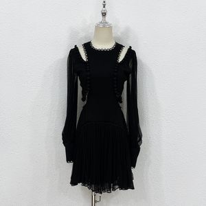 Black off waist dress is fashionable and versatile