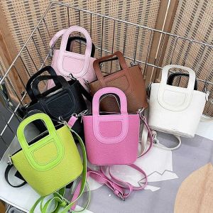 Luxury Picotin Lock Bag Korean version Barnväska Girls 'utomhus Vegetabilisk korg Handväska Mini PU Baby Accessories One Shoulder Crossbody Underarm Bag