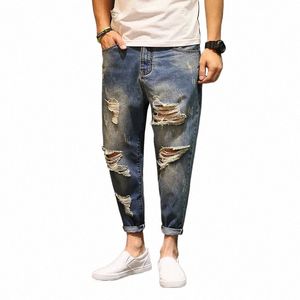Homens Baggy rasgado buraco calças jeans Masculino Distred Harem Jeans Oversize 42 Hip Hop calças jeans cortadas Do estilo antigo Corredores A60504 o9Qq #
