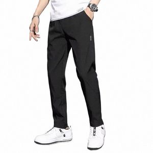 Pantaloni da uomo 2024 Casual Busin Stretch Slim Fit Elastico in vita coreano classico blu nero grigio maschile pantaloni di marca E5r1 #