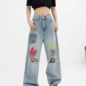 Dżinsy damskie 2024 moda wszechstronna letnia graffiti dziura kieszonkowa do mycia wody dżinsowe prymitywne spodnie podłogowe slam