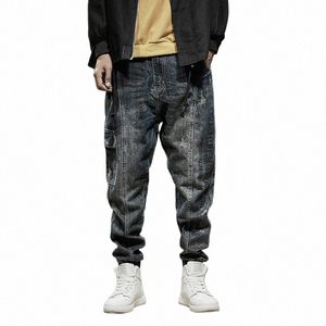 Nyligen designer fi lösa rippade jeans män retro blå casual denim last byxor hombre tryckt designer hip hop joggers män t3xb#