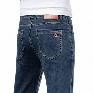 Vår sommarmän tunna raka jeans slät tyg lösa denim stretch byxor manliga märke byxor blå k6ug#