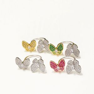 Europa America Fashion Rings Lieben Frauen Messing -Einstellungen farbig Diamant 18k Gold Zwei Schmetterling zwischen dem Fingerring 4 Color296J