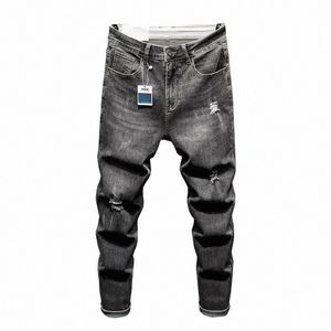 2023 Весенние новые тканевые рваные джинсы больших размеров, классические винтажные мужские брюки из эластичного денима с девятью точками, молодежная жизнеспособность r8Jt #