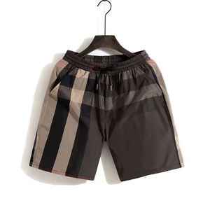 Pantaloncini da uomo 20214Pantaloncini da uomo firmati da donna Marchio estivo Moda allentato Streetwear Abbigliamento Asciugatura rapida Costumi da bagno Bordo di stampa Pantaloni da spiaggia Uomo Pantaloncini da bagno