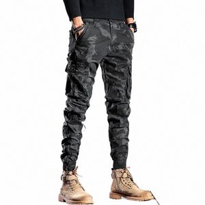 fi Designer Uomo Jeans Pantaloni mimetici Multi tasche Pantaloni cargo casual Hombre Zipper Bottom Hip Hop Joggers 21oa #