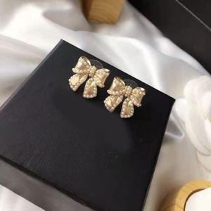 2021 new fashion Knot pearl bow earrings ladies 925 silver needles simple all-match jewelry2052