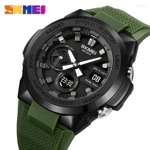 Orologi da polso SKMEI Orologio elettrico da uomo Oro Verde Impermeabile Nuoto Specchio in resina Orologio mondiale Cronometro 5 set di sveglia Conto alla rovescia