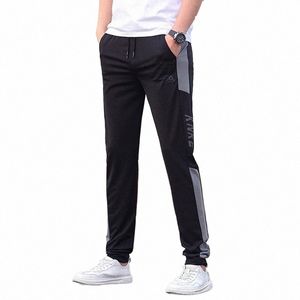 estate sottile alto uomo jogging sport casual pantaloni air-cditier 113 cm 117 cm extra lg sciolto sudore pista harem pantaloni sportivi maschili 18hN #