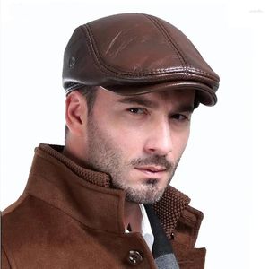Berets Primeira camada de couro de couro chapéu homens inverno / primavera masculino quente orelha proteção boné genuíno pai atacado lei