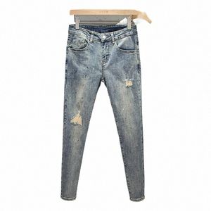 Snygga mäns casual cott byxor koreansk stil blå smala jeans med distraherade hål målar splatter för sommar ungdomar d4ns#