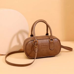 Negozi Export Designer Borse a tracolla Borsa da donna 2024 Nuovo piccolo quadrato portatile alla moda ed elegante con temperamento texture Versatile cuscino a tracolla