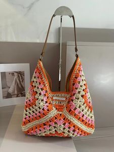 Designer Summer Beach Bags Raffia Straw Large Totes kontrastfärger Kvinnliga lyxvarumärke mode vävd shopping axelväska ihålig handväska stor kapacitet 2661